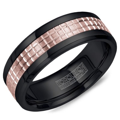 A Black Cobalt Torque Band With A Cerved Rose Gold Center.