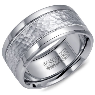 A Torque Ring In White Cobalt With A Hammered White Gold Center And Milgrain Detailing.